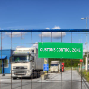 Trucks,Pass,Through,The,Checkpoint,Of,The,Customs,Logistics,Terminal.